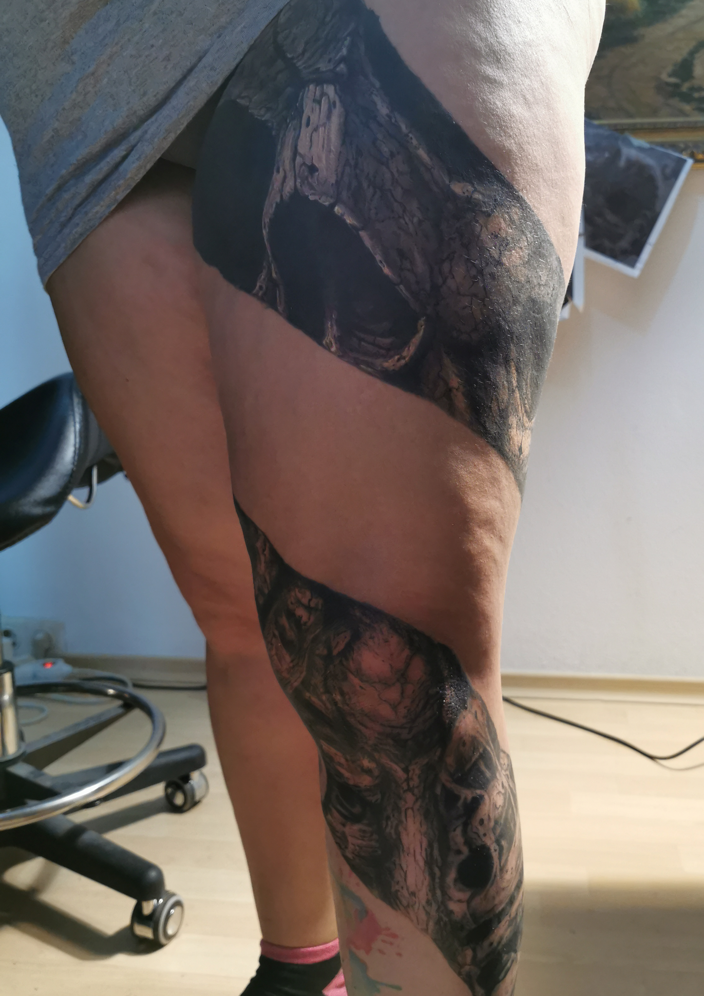 Detailed freehand full leg cover up skulls and bones 