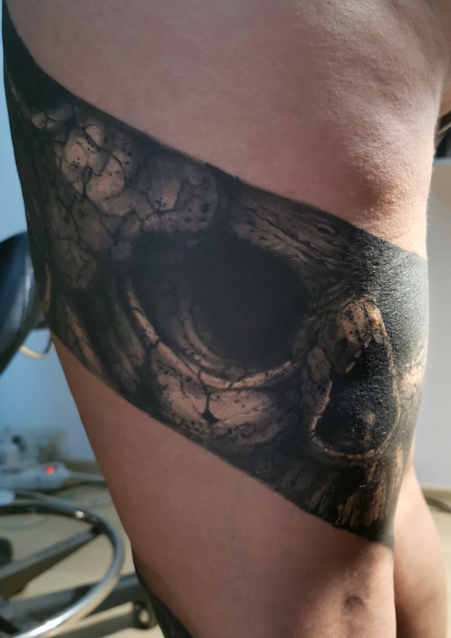 Detailed freehand full leg cover up skulls and bones 